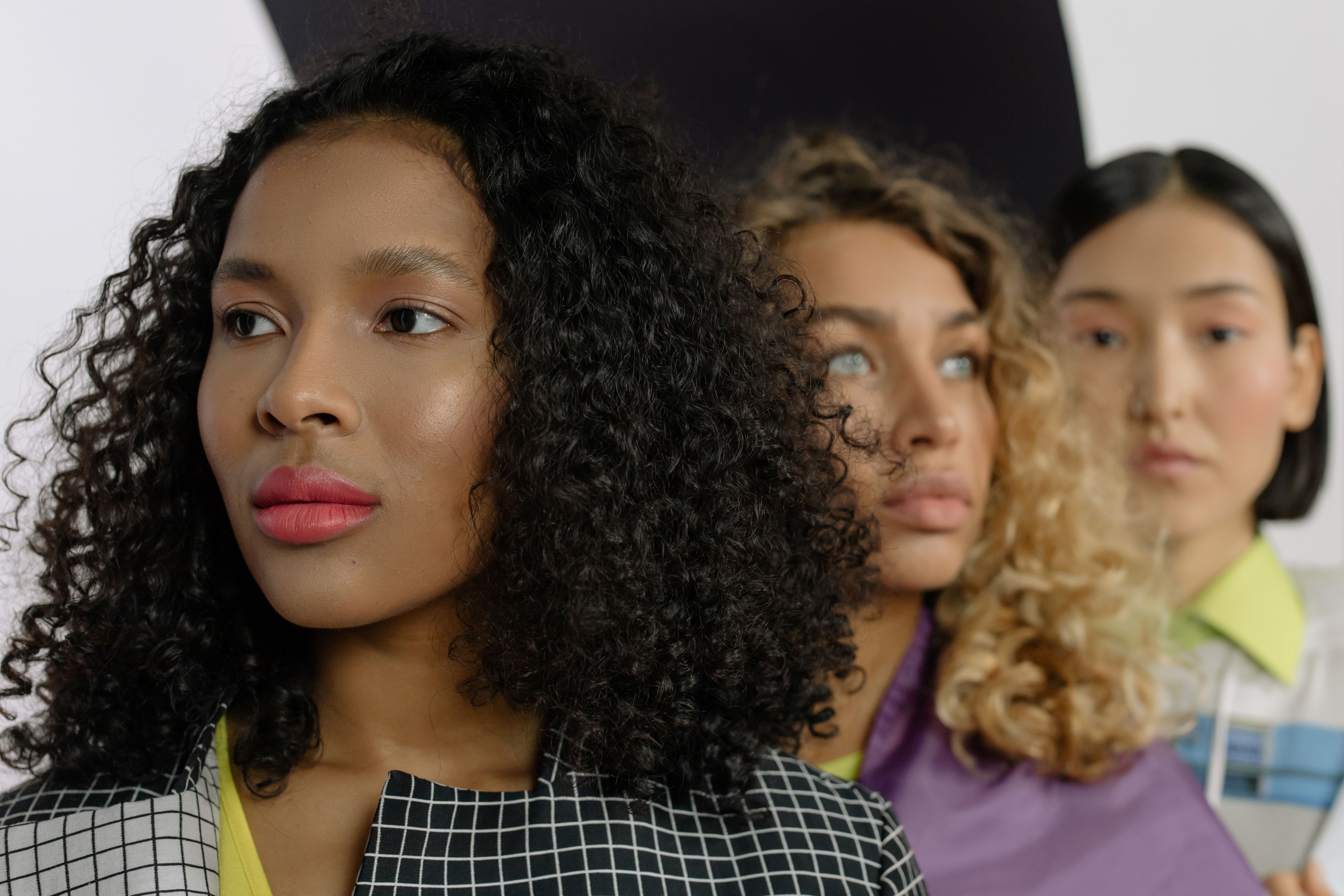 People with different curly and coily hair patterns